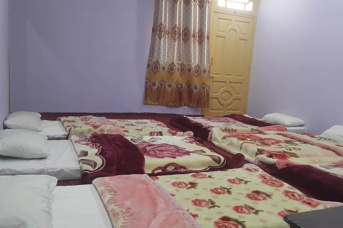 Economy Quadruple Room | Down comforters, blackout drapes, iron/ironing board (on request)
