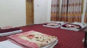 Economy Quadruple Room | Down comforters, blackout drapes, iron/ironing board, rollaway beds - WHITE STONE GUEST HOUSE (Gilgit)