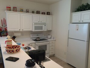 Condo (22D Sandpiper Bay (Sunset Beach)) | Private kitchen | Fridge, microwave, stovetop, dishwasher - 22D Sandpiper Bay (Sunset Beach)