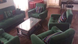 Standard Quadruple Room | Living area - ASAO (Dakar)