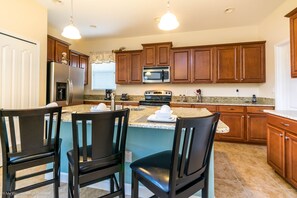 Paradise Palms Resort 5 Bedroom Vacation Home with Pool (2000) | Private kitchen | Full-size fridge, microwave, oven, stovetop