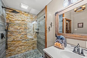 Shower, hair dryer, towels, soap