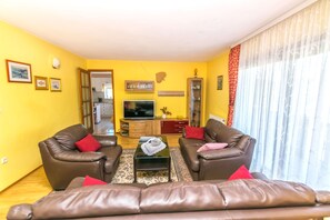 Apartamento (A1) | Sala de estar | TV