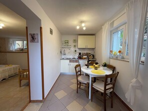 Studio (A1) | Private kitchen | Fridge, stovetop, cookware/dishes/utensils, freezer - Apartments Milivoj (Krk)