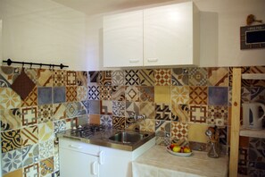 Private kitchen | Fridge, stovetop, cookware/dishes/utensils, freezer - Apartments Nina (Senj)