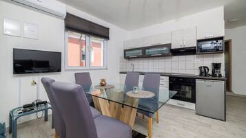 Apartment (A1) | Private kitchen | Fridge, microwave, oven, stovetop