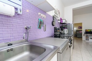 Apartment (A2) | Private kitchen | Fridge, microwave, oven, stovetop - Apartments Ines (Rab)
