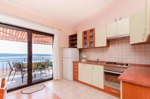 Apartment (A2) | Private kitchen | Fridge, oven, stovetop, espresso maker - Apartments Nenad (Crikvenica)