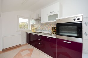 Apartment (A3) | Private kitchen | Fridge, oven, stovetop, espresso maker - Apartments Bozana (Crikvenica)