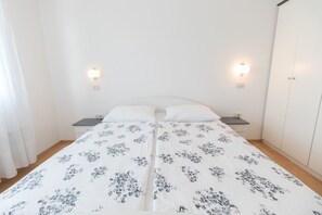 Wi-Fi de cortesia, roupa de cama