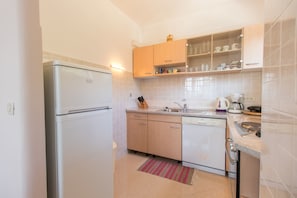 Cozinha privada | Geladeira, fogão, cooktop, lava-louças