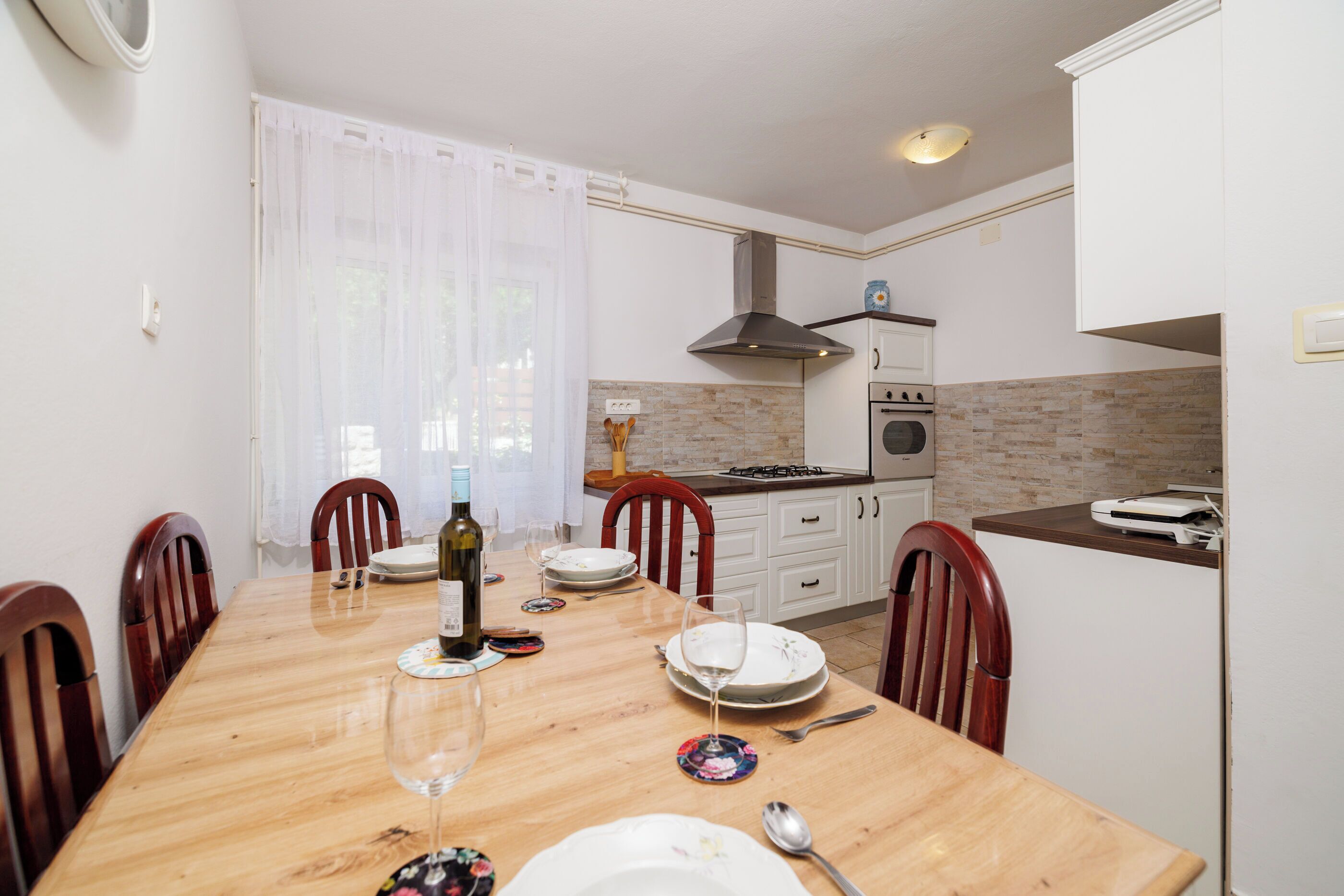 Apartamento (A4) | Cozinha privada | Geladeira, cooktop, talheres/pratos/utensílios de cozinha