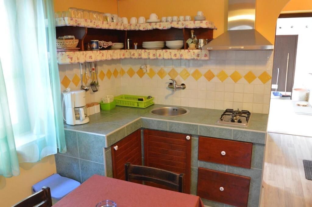 Appartamento (A3) | Cucina privata | Frigorifero, piano cottura, macchina per caffè espresso