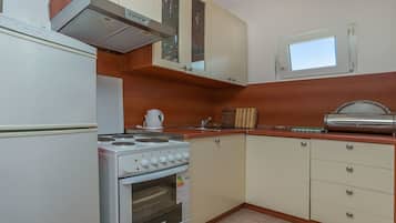 Departamento (A1) | Cocina privada | Refrigerador y parrilla de estufa
