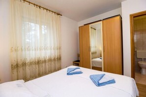 อพาร์ทเมนท์ (A1) | 3 ห้องนอน, เตารีด/โต๊ะรีดผ้า, Wi-Fi ฟรี, ผ้าปูที่นอน