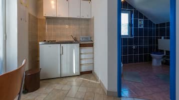 Cozinha privada | Geladeira, cooktop, lava-louças, máquina de café expresso