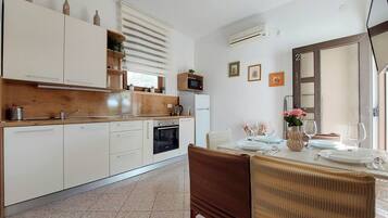 Apartment (A2) | Private kitchen | Fridge, stovetop, espresso maker, cookware/dishes/utensils