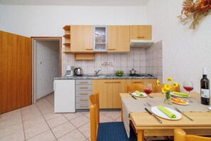 Apartment (A3) | Private kitchen | Fridge, stovetop, espresso maker, coffee/tea maker - Apartments Krunoslav (Punat)