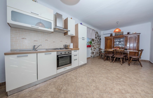 Fridge, oven, stovetop, espresso maker