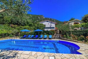 Outdoor pool, pool umbrellas, pool loungers