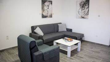 Apartment (A1) | Living room | Flat-screen TV