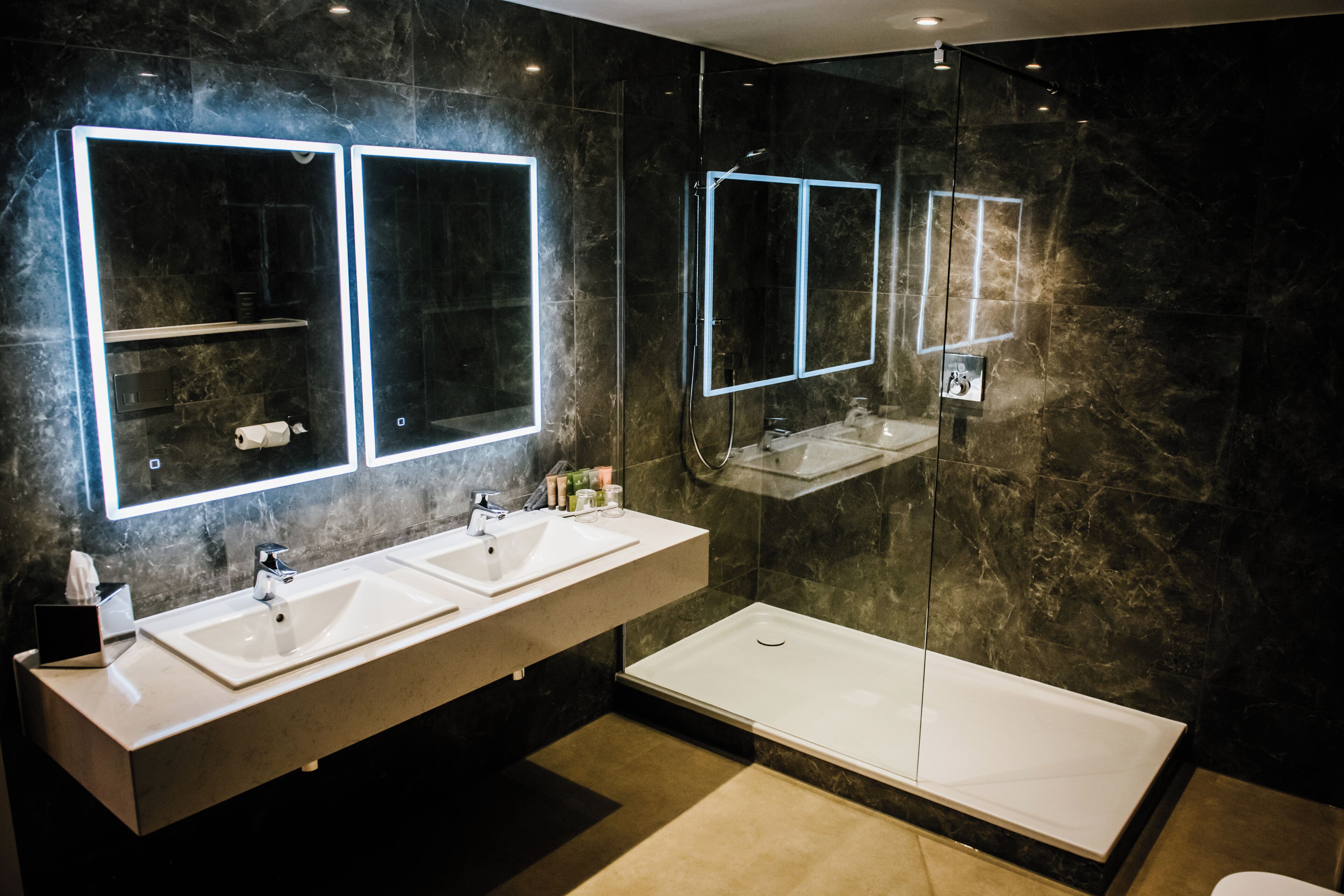 superior double room | bathroom | shower, free toiletries, hair dryer, towels