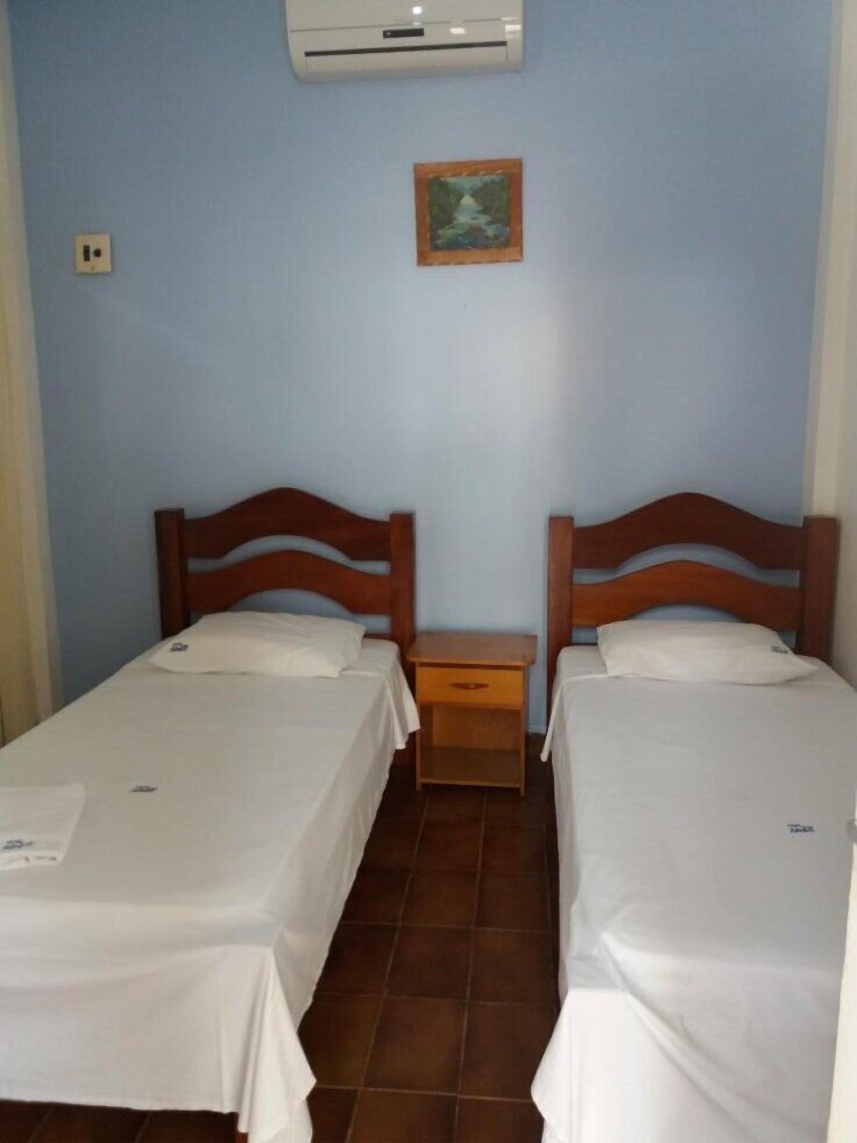 Habitación estándar doble | Minibar, cortinas opacas, tabla de planchar con plancha y wifi gratis