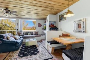 Deluxe Room | Living area | Flat-screen TV