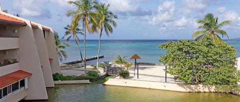 On the beach, sun loungers, beach towels