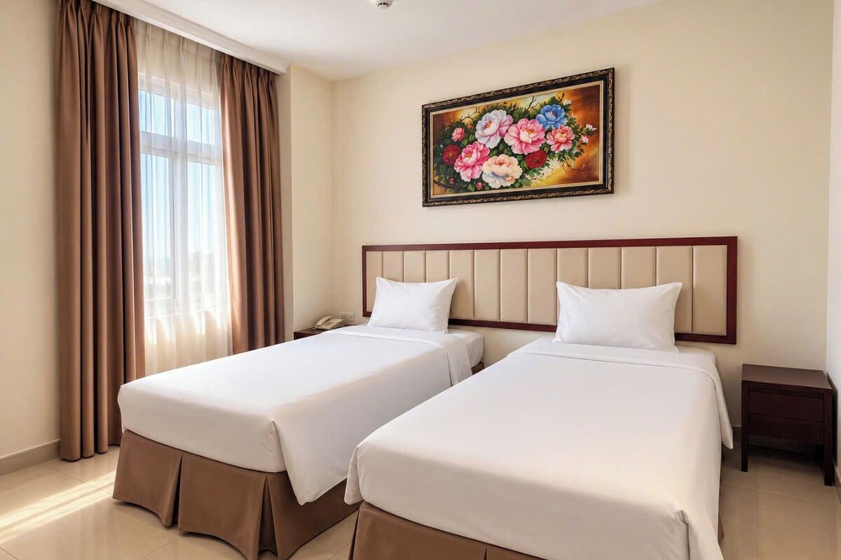 Deluxe Twin Room | 1 bedroom, minibar, desk, laptop workspace