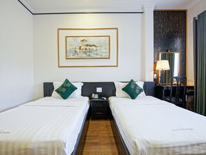 Quarto luxo | Frigobar, escrivaninha, quartos à prova de som, Wi-Fi de cortesia
