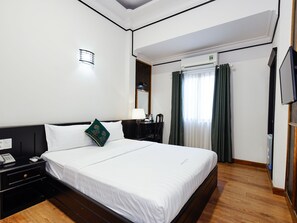 Quarto luxo | Frigobar, escrivaninha, quartos à prova de som, Wi-Fi de cortesia