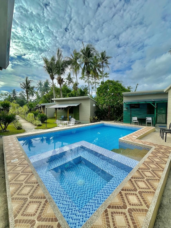 Deluxe Double Room | Bed sheets - 13 Ways Room Rental (Panglao)