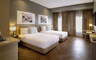 Deluxe Room, 2 Twin Beds | Premium bedding, in-room safe, desk, laptop workspace