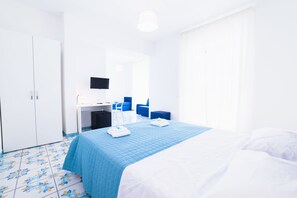Standard-Vierbettzimmer | Italienische Bettbezüge von Frette, hochwertige Bettwaren, Zimmersafe