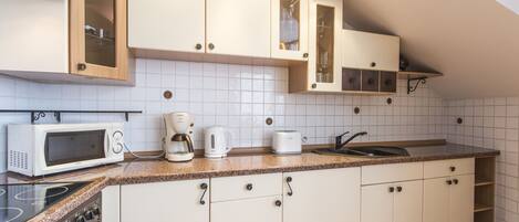 Deluxe Duplex | Private kitchen | Fridge, microwave, stovetop, coffee/tea maker