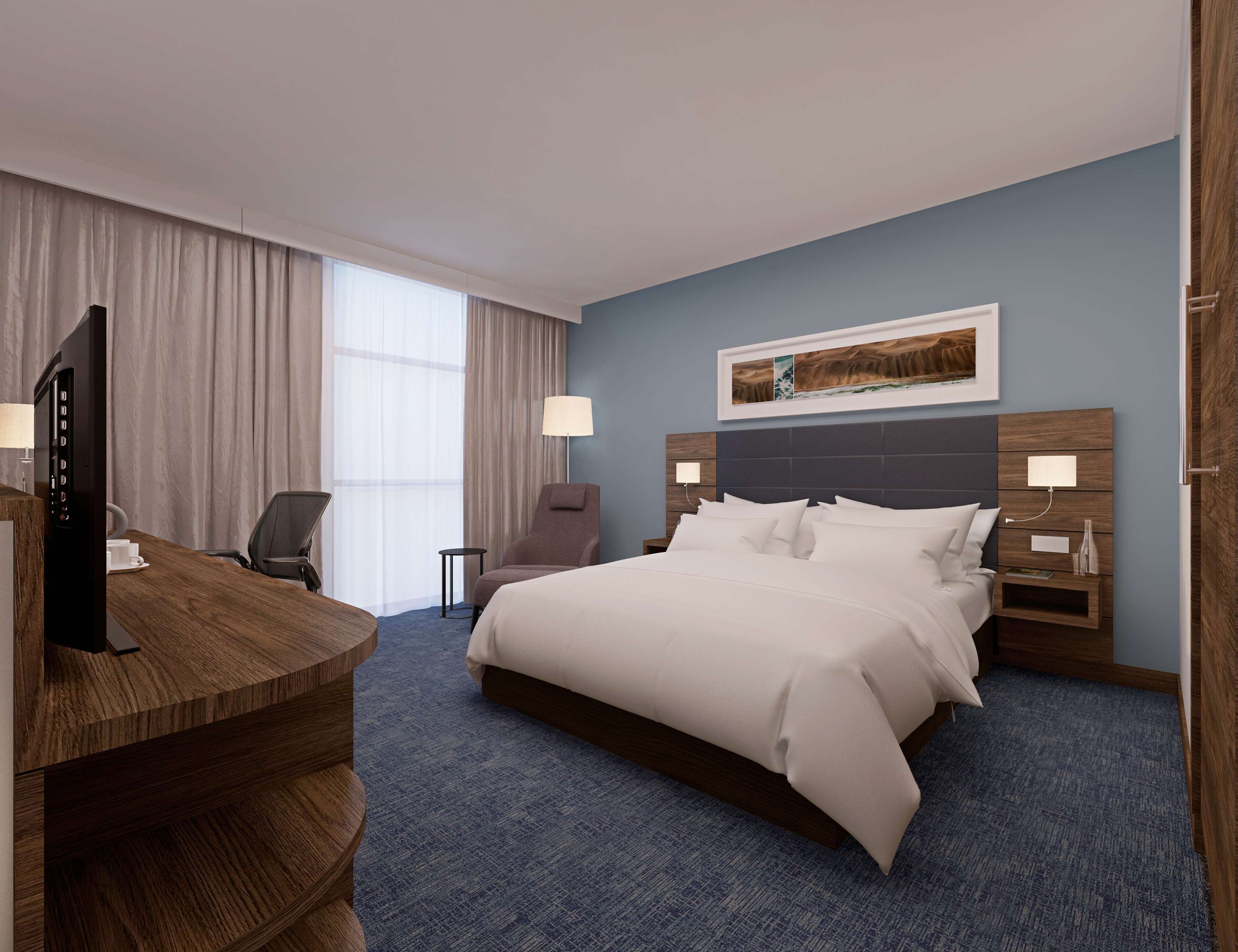 Premium bedding, in-room safe, desk, soundproofing