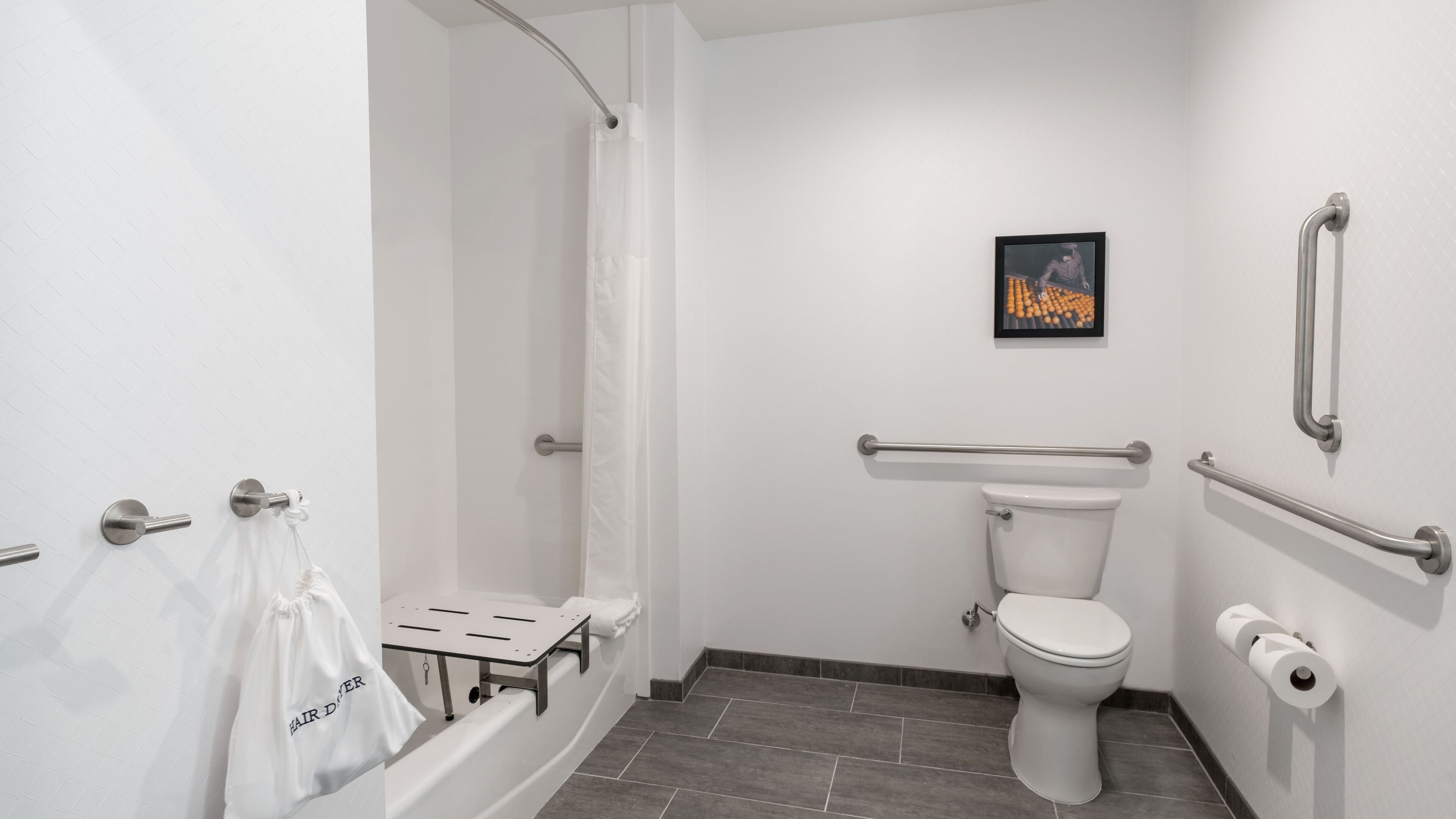 rainfall showerhead, designer toiletries, hair dryer, towels