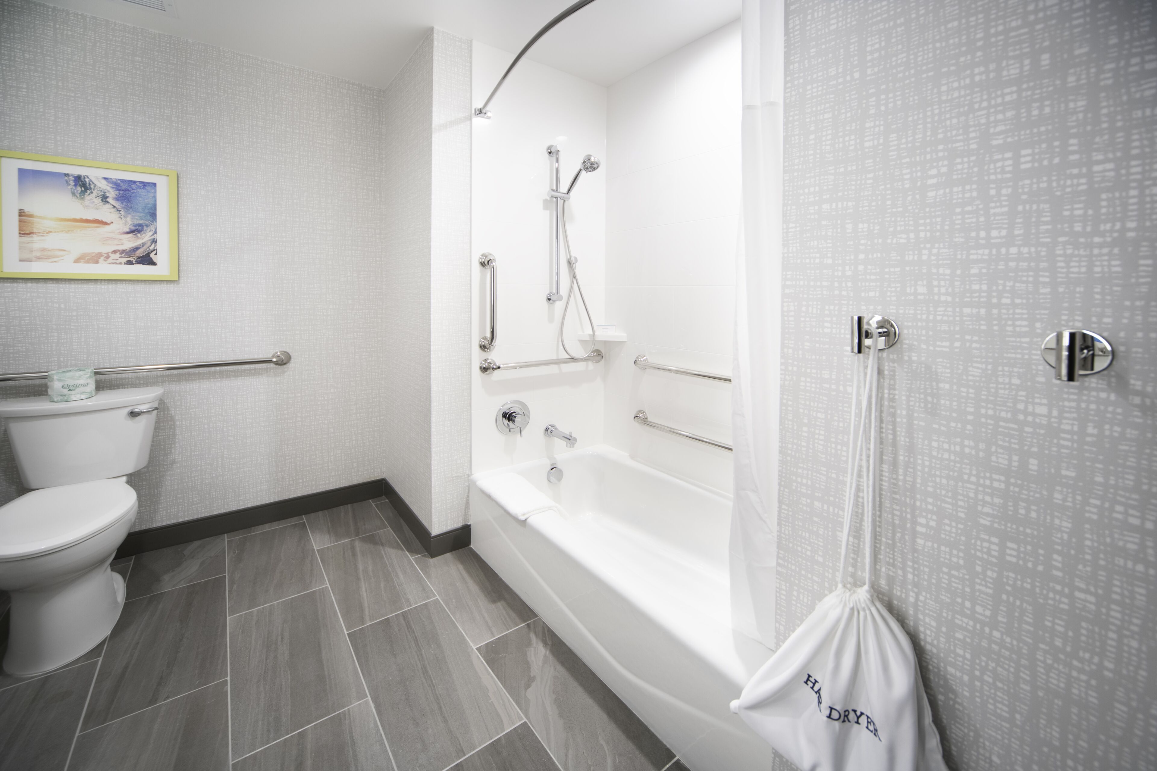 combined shower/bathtub, free toiletries, hair dryer, towels