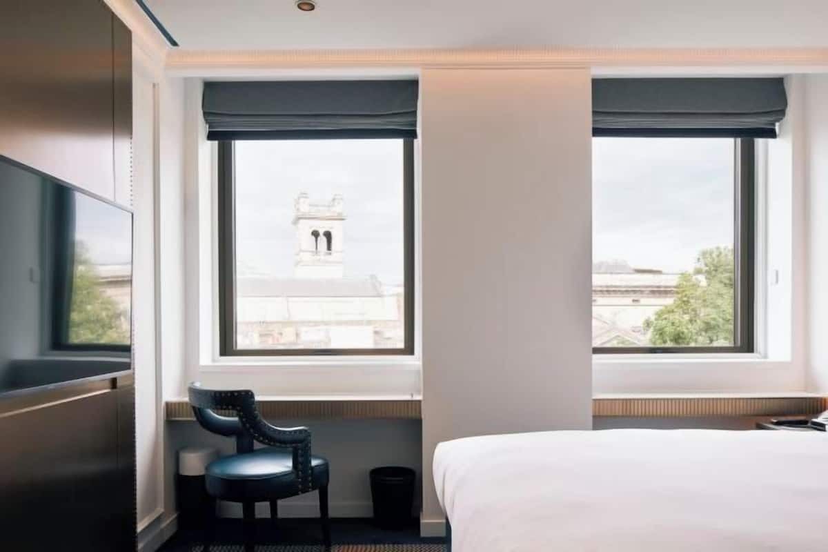Hypo-allergenic bedding, free minibar items, in-room safe, desk