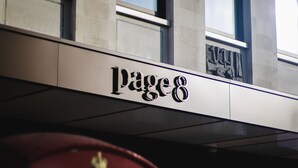 A building sign with the text "Page 8". - Page8, Page Hotels (London)