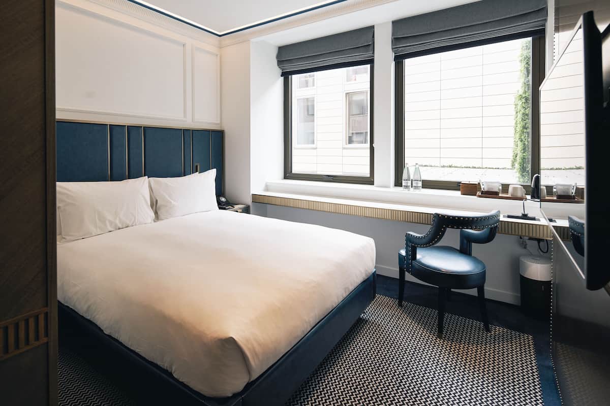 Hypo-allergenic bedding, free minibar items, in-room safe, desk