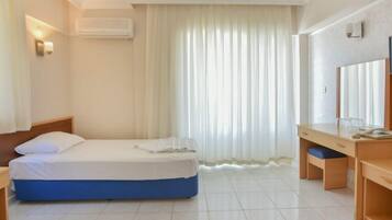 Desk, blackout drapes, soundproofing, rollaway beds