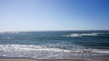 On the beach, sun loungers, beach towels