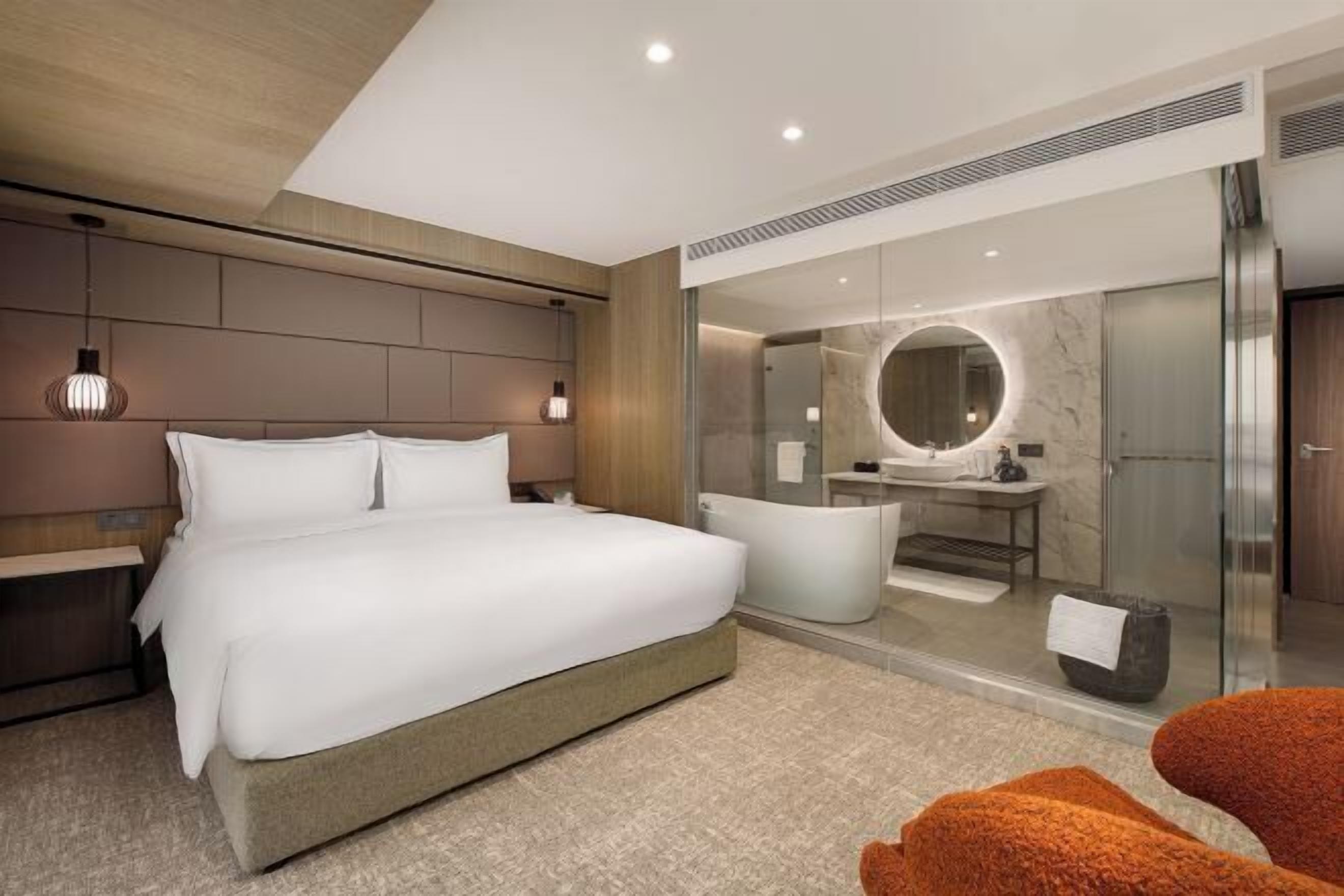 Premium bedding, down comforters, in-room safe, blackout drapes