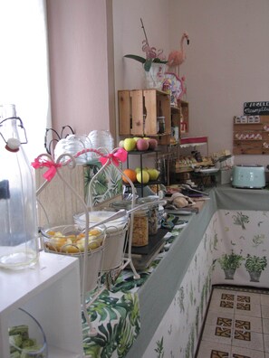 Enjoy a sumptuous spread at our buffet, featuring a variety of dishes and refreshing drinks.