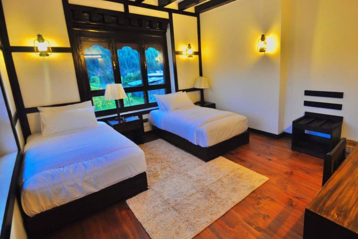 Habitación Deluxe con 2 camas individuales | 1 dormitorio, camas supletorias, wifi gratis