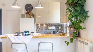 Apartment, 1 Bedroom | Private kitchen | Full-size fridge, oven, stovetop, dishwasher
