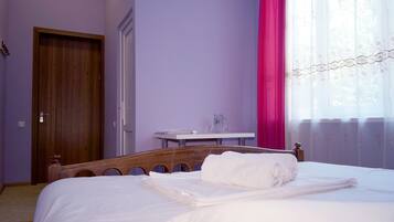 Deluxe Room | Minibar, desk, laptop workspace, blackout drapes