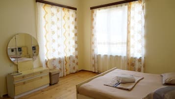 Basic Double Room | Minibar, desk, laptop workspace, blackout drapes